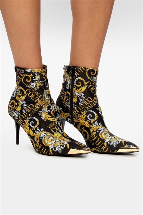 versace denim|Versace denim boots.